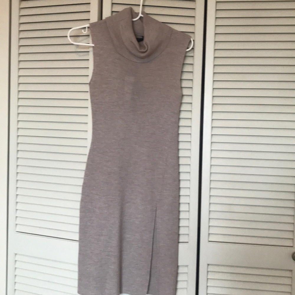 Long tunic with a split on the front left.